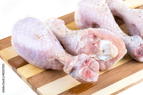 Photo: Close up of fresh raw chicken legs Close up of fresh raw chicken legs
