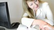 business woman making notes in a diary