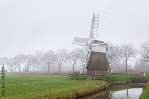 Photo: Dutch windmill in fog Dutch windmill in fog