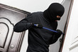 thief burglar at house breaking
