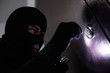 thief burglar at house breaking