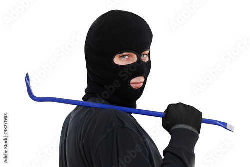 Photo: thief burglar with metal crowbar thief burglar with metal crowbar