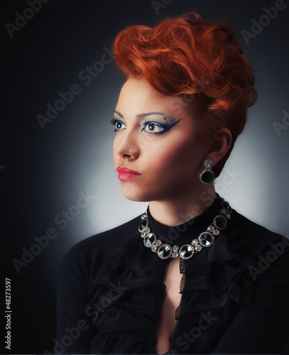 Photo: Glamour portrait of a young women, studio shot Glamour portrait of a young women, studio shot