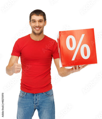 Photo: man with percent sign man with percent sign