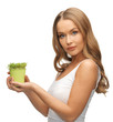 woman with green grass in pot