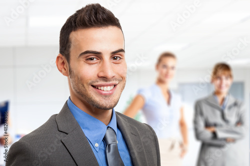 Photo: Smiling businessman portrait Smiling businessman portrait