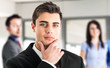 Businessman in front of his team
