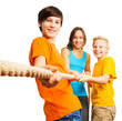 Photo: Three happy kids pull the rope Three happy kids pull the rope