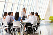 Photo: Business People Having Board Meeting In Modern Office Business People Having Board Meeting In Modern Office