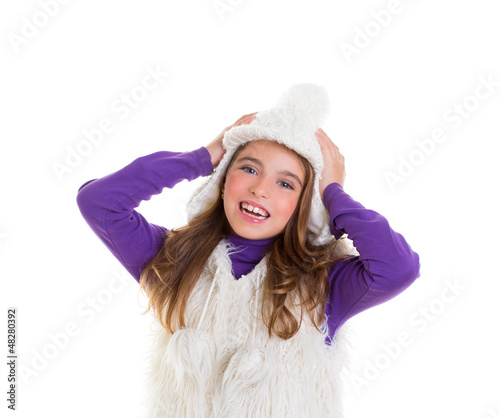Photo: blue eyes happy child kid girl with white winter cap blue eyes happy child kid girl with white winter cap