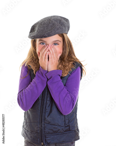 Photo: Child kid shy girl smiling hiding her face with hand Child kid shy girl smiling hiding her face with hand