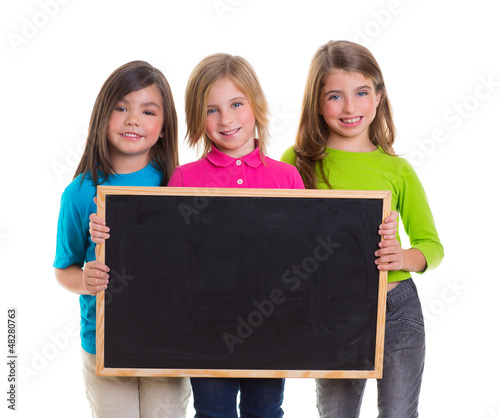 Photo: children girls group holding blank blackboard copy space children girls group holding blank blackboard copy space