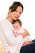 Baby girl relaxed with pacifier hug in mother arms