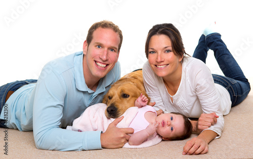 Photo: Baby mother and father happy family and dog Baby mother and father happy family and dog