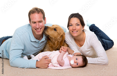 Photo: Baby mother and father happy family and dog Baby mother and father happy family and dog