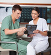 Medical Technicians Discussing About X-ray