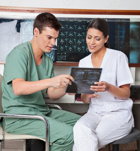Photo: Medical Technicians Discussing About X-ray Medical Technicians Discussing About X-ray