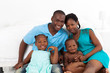 happy african american family in bedroom