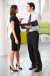 Businessman And Businesswomen Having Meeting In Office