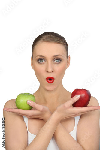 Photo: Pretty woman with apples in hands Pretty woman with apples in hands