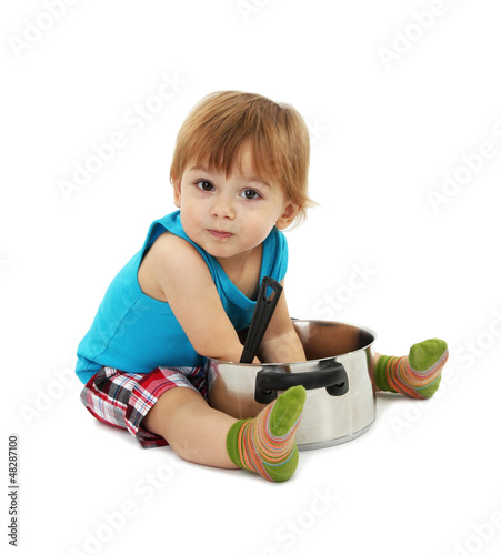 Photo: cute little boy with casserole, isolated on white cute little boy with casserole, isolated on white