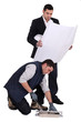 tiler and businessman posing together