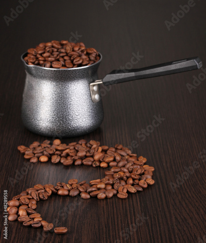Photo: Coffee maker on brown table Coffee maker on brown table