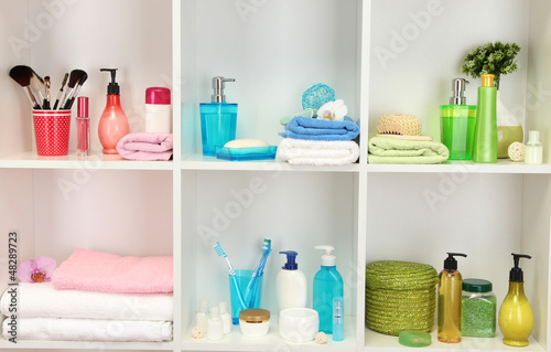 Photo: Bath accessories on shelfs in bathroom Bath accessories on shelfs in bathroom