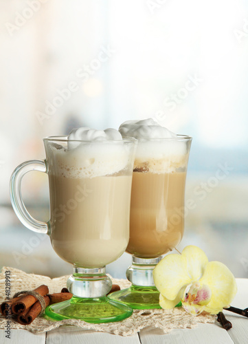 Photo: Fragrant coffee latte in glasses cups with spices, Fragrant coffee latte in glasses cups with spices,