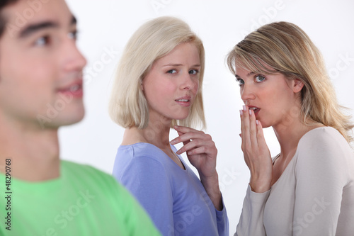 Photo: Girls criticizing boy Girls criticizing boy