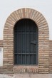 Photo: Large window or door with grate and metal mesh Large window or door with grate and metal mesh