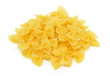 Photo: Heap of farfalle pasta isolated on white background Heap of farfalle pasta isolated on white background