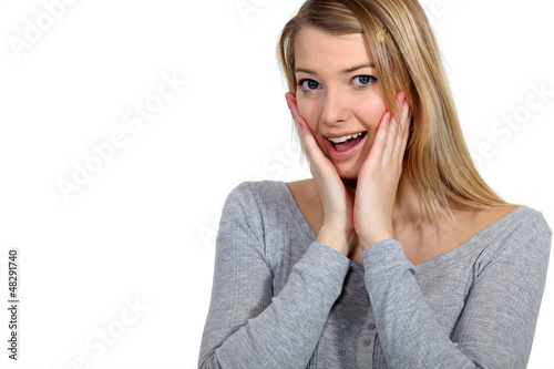 Photo: Shocked blond woman Shocked blond woman
