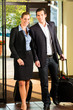 Business people arriving at Hotel