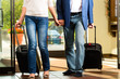 Senior married couple arriving at Hotel