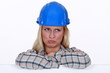 Sad female builder