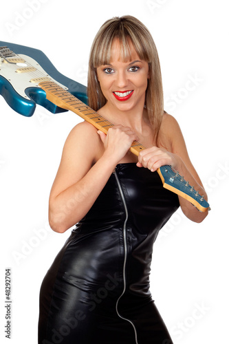 Photo: Sexy guitarist with a black leather dress Sexy guitarist with a black leather dress