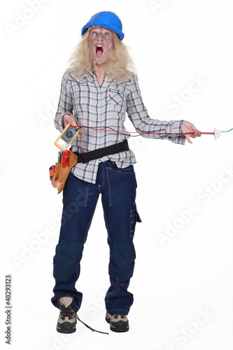 Photo: Woman suffering from electric shock Woman suffering from electric shock