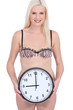 Woman in underwear holding wall clock