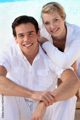 Photo: Young couple in white Young couple in white