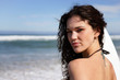 Woman with a surfboard
