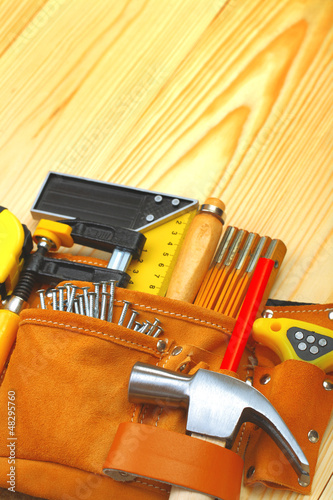 Photo: tools in belt on table tools in belt on table