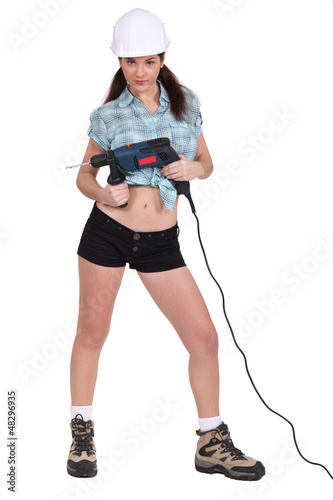 Photo: Woman with a power drill Woman with a power drill
