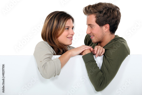 Photo: A cute couple in love. A cute couple in love.