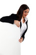 Alluring woman holding up a blank sign