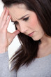 close-up picture of young woman having migraine