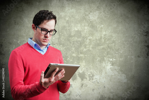 Photo: Young man with tablet Young man with tablet