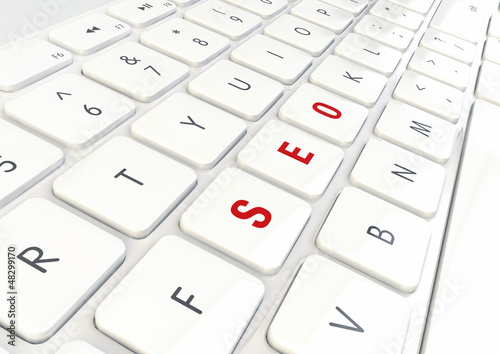 Illustration: Seo Concept - Word Written on White Shiny Keyboard Seo Concept - Word Written on White Shiny Keyboard