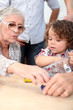 Grandmother playing with grandson