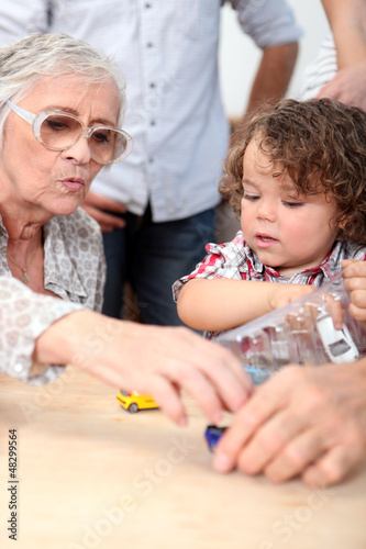 Photo: Grandmother playing with grandson Grandmother playing with grandson